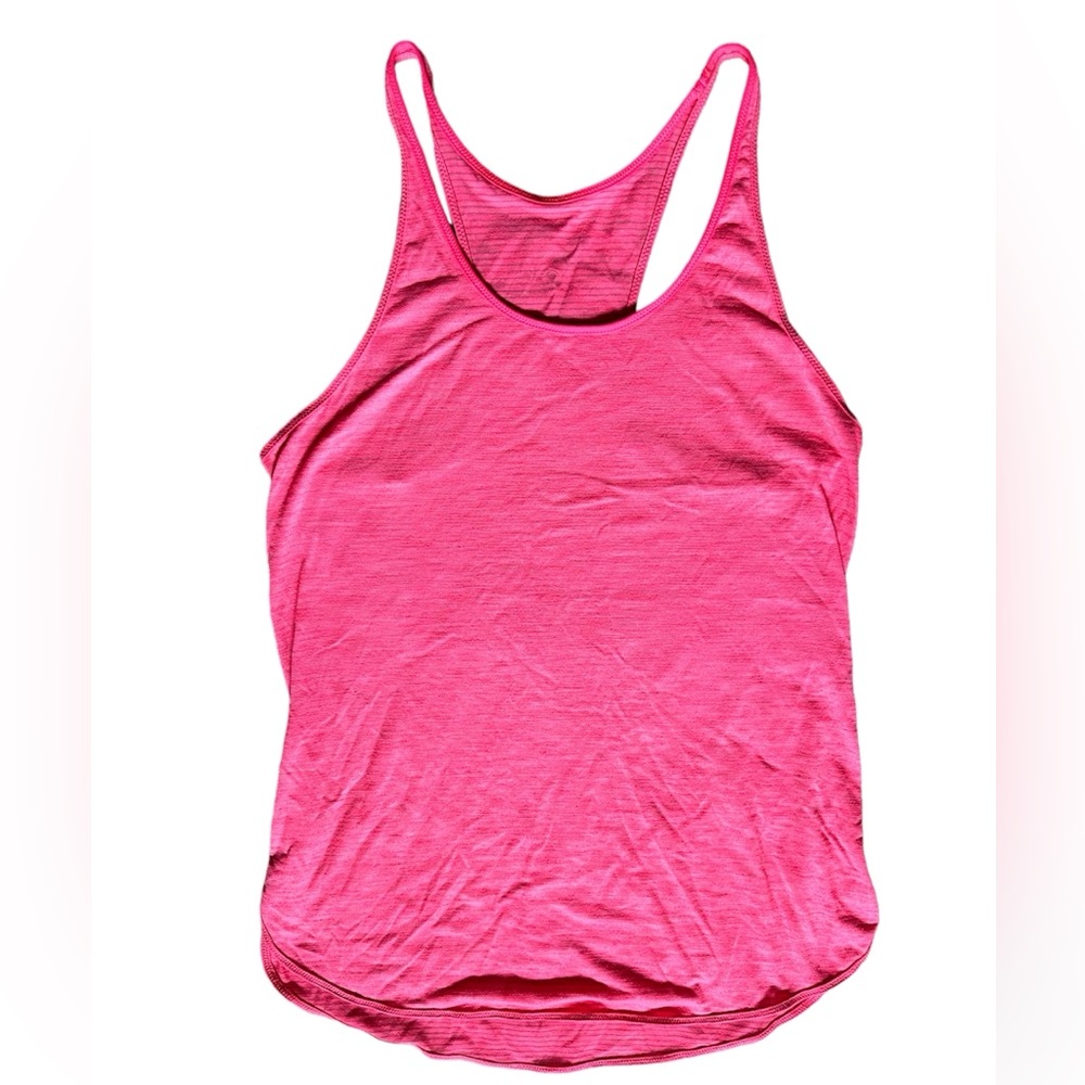 Lululemon bright coral used loose tank. Size 10 with tags removed.